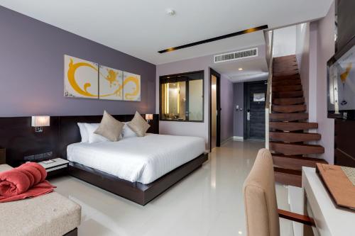 Suite Executive del hotel The Charm Resort Phuket. Foto 1