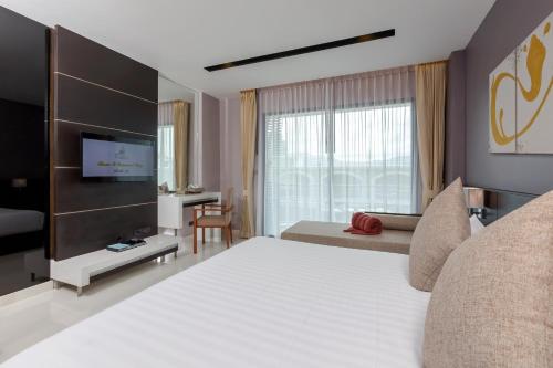 Suite Executive del hotel The Charm Resort Phuket. Foto 2