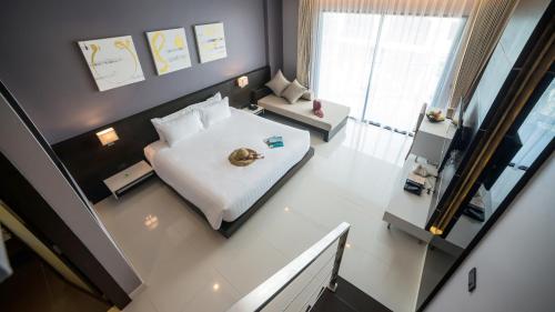 Suite Executive del hotel The Charm Resort Phuket. Foto 3