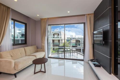 Suite Encanto del hotel The Charm Resort Phuket. Foto 1