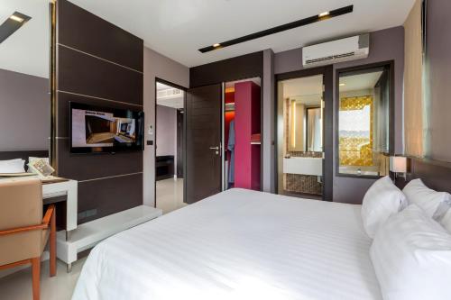 Suite Encanto del hotel The Charm Resort Phuket. Foto 2