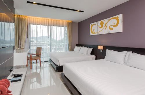 Suite Familiar de 1 dormitorio del hotel The Charm Resort Phuket