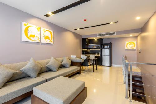 Suite Familiar de 1 dormitorio del hotel The Charm Resort Phuket. Foto 8
