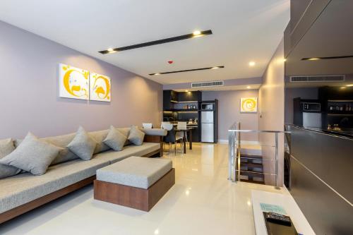 Suite Familiar de 1 dormitorio del hotel The Charm Resort Phuket. Foto 9