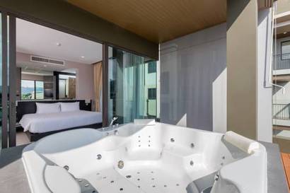 Suite 2 habitaciones Familiar del hotel The Charm Resort Phuket. Foto 4