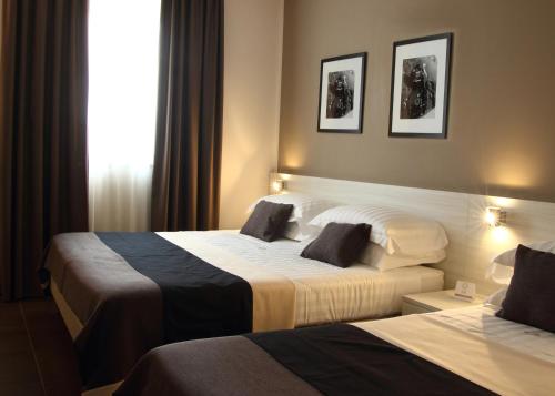 Habitación Triple del hotel Stelle The Businest. Foto 1