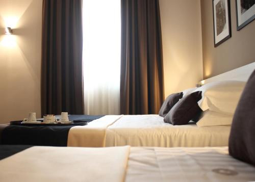 Habitación Triple del hotel Stelle The Businest. Foto 4