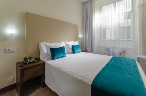 Habitación Doble Estándar del hotel Lx Rossio. Foto 1