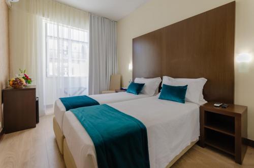 Habitación Doble - 2 camas del hotel Lx Rossio. Foto 3