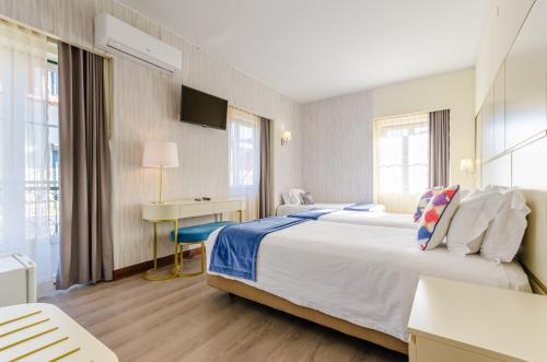 Habitación Triple del hotel Lx Rossio. Foto 1