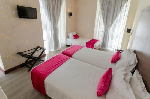 Habitación Triple del hotel Lx Rossio. Foto 6
