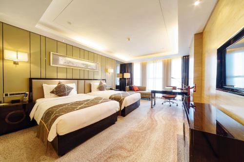 Habitación Doble Superior - 2 camas del hotel Pullman Wuxi New Lake. Foto 1