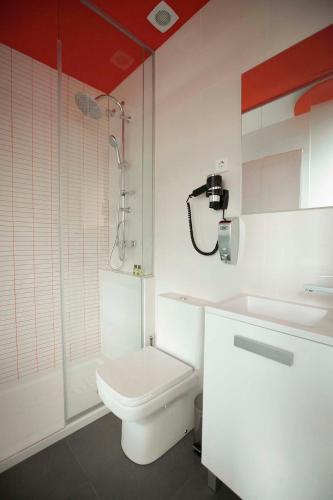 Habitación Doble con cama supletoria del hotel Vitium Urban Suites