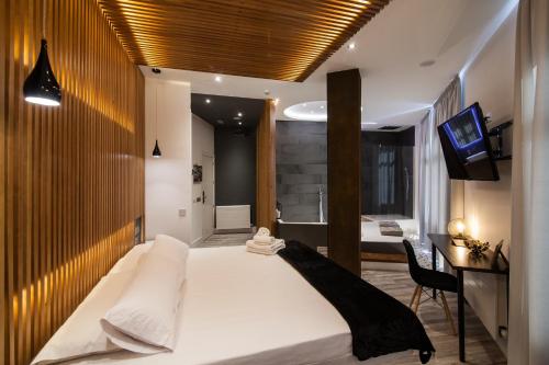 Habitación Doble Premium con jacuzzi del hotel Vitium Urban Suites. Foto 8