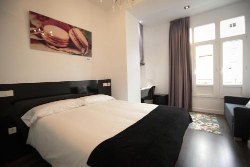 Habitación Doble Superior con vistas a la ciudad del hotel Vitium Urban Suites. Foto 9