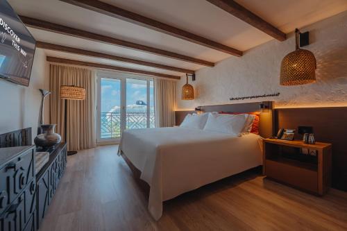 Habitación con vista al océano y cama extragrande - Solo adultos del hotel Renaissance Wind Creek Aruba Resort