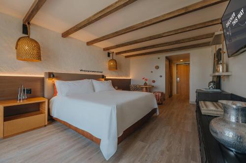 Habitación con vista al océano y cama extragrande - Solo adultos del hotel Renaissance Wind Creek Aruba Resort. Foto 4