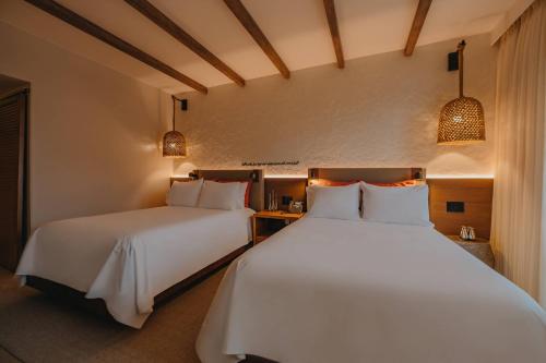 Habitación Resort con 2 camas dobles - Solo adultos del hotel Renaissance Wind Creek Aruba Resort. Foto 3