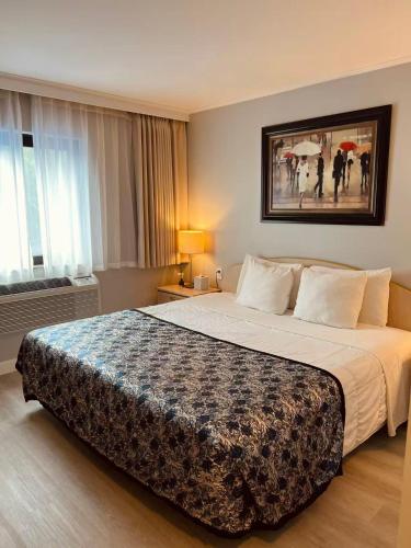 Habitación Estándar con cama doble del hotel Flushing Central. Foto 1