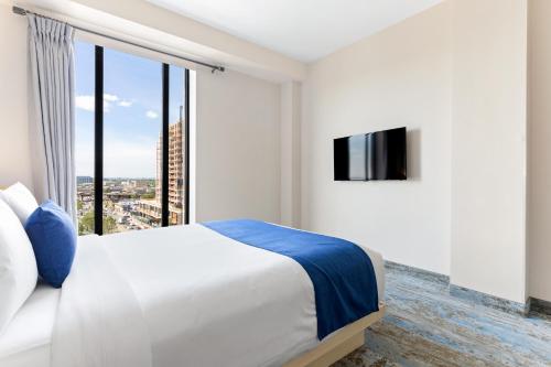 Habitación Deluxe - 1 cama grande del hotel The Parc. Foto 2