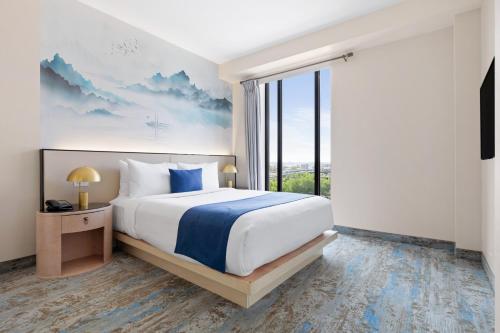 Habitación Deluxe - 1 cama grande del hotel The Parc. Foto 3