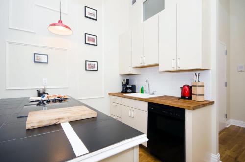 Suite Loft del hotel The Box House Hotel Brooklyn. Foto 4