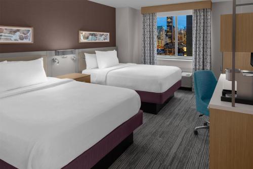 Habitación doble Vista ciudad 2 Camas queen del hotel Hilton Garden Inn New York/manhattan-midtown East. Foto 1