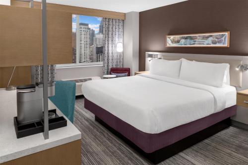 Habitación doble 1 Cama king Vista ciudad del hotel Hilton Garden Inn New York/manhattan-midtown East. Foto 3