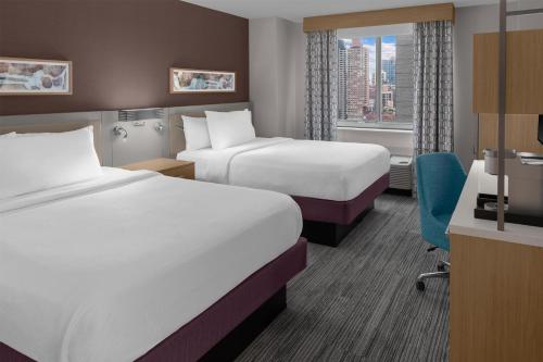 Habitación doble Vista ciudad 2 Camas queen del hotel Hilton Garden Inn New York/manhattan-midtown East. Foto 2