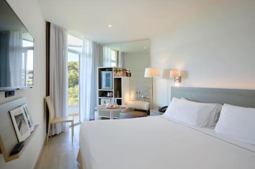 HABITACION COMUNICADA del hotel Melia Cala Galdana - Menorca. Foto 3