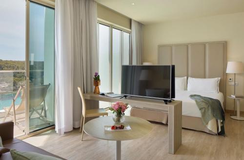 Suite The Level Cala Galdana con vistas al mar del hotel Melia Cala Galdana - Menorca. Foto 14