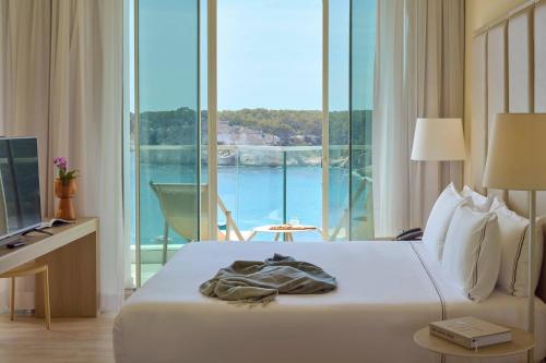 Suite The Level Cala Galdana con vistas al mar del hotel Melia Cala Galdana - Menorca. Foto 17