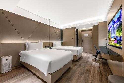 Habitación Doble Estándar - 2 camas del hotel Mercure Harbin Central Street Sophia Church. Foto 3