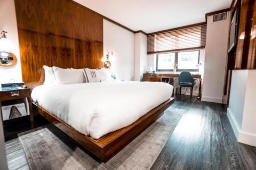 Habitación Deluxe con cama extragrande del hotel Hugo