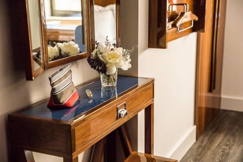 Habitación Cuádruple Deluxe del hotel Hugo. Foto 4