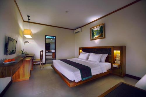 Deluxe con vistas al jardín del hotel Aston Sunset Beach Resort - Gili Trawangan