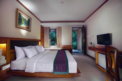 Deluxe con vistas al jardín del hotel Aston Sunset Beach Resort - Gili Trawangan. Foto 2
