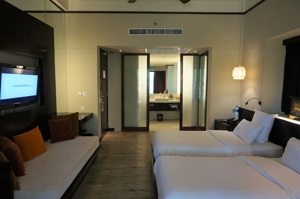 Habitación Superior con Dos Camas Individuales del hotel Novotel Lombok Resort y Villas. Foto 2