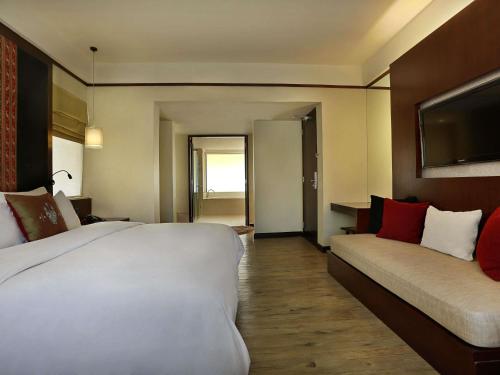 Habitación Ejecutiva con 1 Cama King del hotel Novotel Lombok Resort y Villas. Foto 1