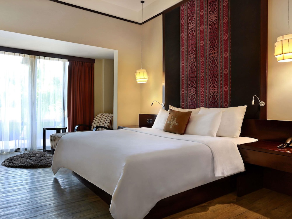 Habitación Deluxe con Terraza y Dos Camas Individuales del hotel Novotel Lombok Resort y Villas. Foto 3