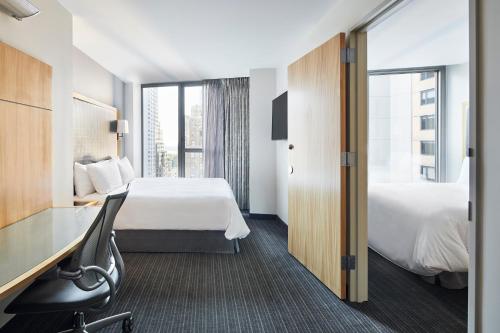 Habitación Familiar - 2 camas grandes del hotel Club Quarters World Trade Center