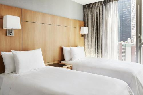 Habitación Doble Estándar - 2 camas del hotel Club Quarters World Trade Center. Foto 1