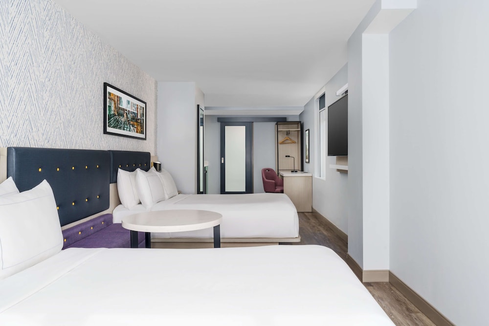 Habitación Deluxe, 2 camas de matrimonio del hotel DoubleTree by Hilton New York Midtown Fifth Ave. Foto 3