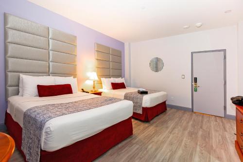 Habitación adaptada - 2 camas dobles del hotel St. James. Foto 4