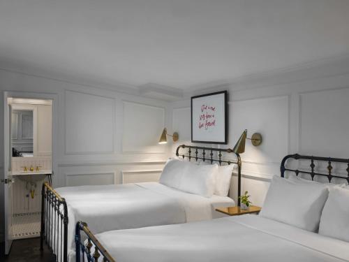 Habitación clásica con ducha accesible en silla de ruedas - Cama grande del hotel Life New York. Foto 7