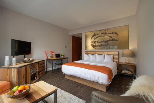 Habitación Premier con vistas a la ciudad - 1 cama extragrande del hotel Ravel Hotel, Trademark Collection by Wyndham. Foto 3