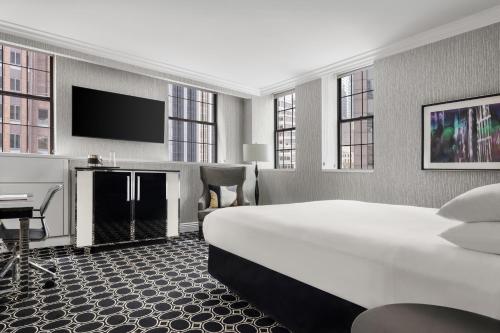 Executive Esquinera con cama extragrande del hotel The Muse New York, a Kimpton