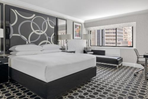 Executive con cama extragrande del hotel The Muse New York, a Kimpton. Foto 1