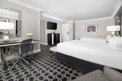 Habitación Executive con 2 camas grandes del hotel The Muse New York, a Kimpton. Foto 7