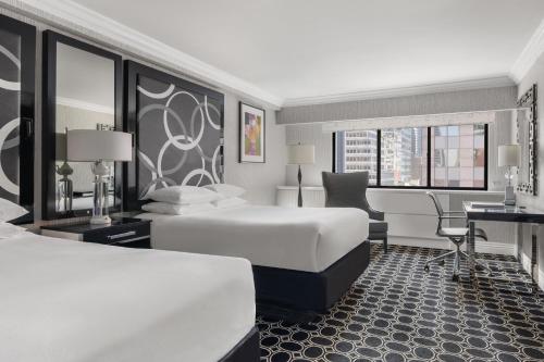 Habitación Executive con 2 camas grandes del hotel The Muse New York, a Kimpton. Foto 2